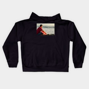 Surfer watching the waves Kids Hoodie